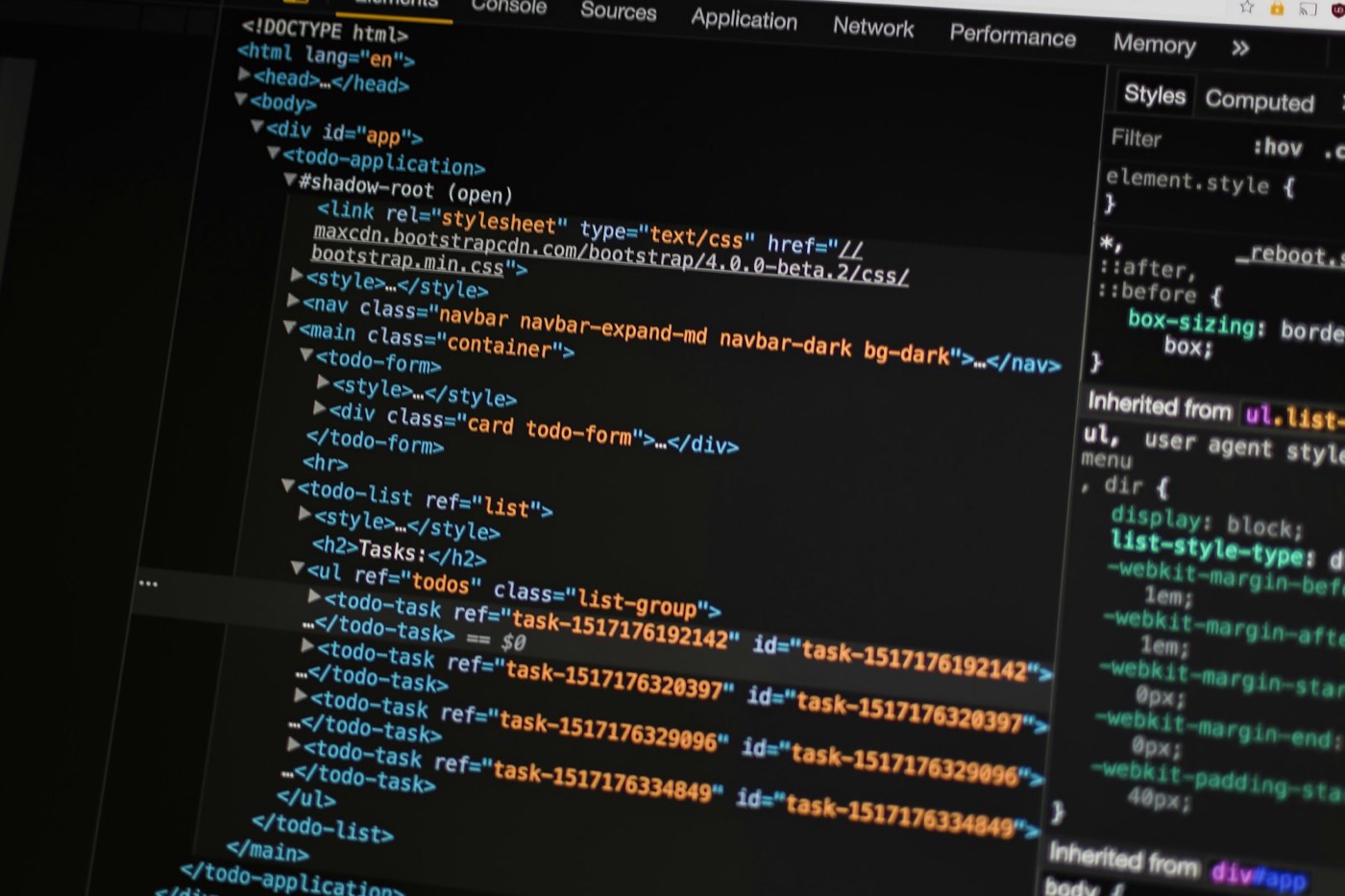 Developer inspecting application code and DOM in browser developer tools